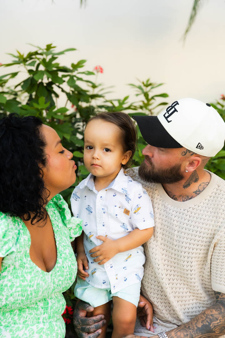 Everyone leaning in for a kiss and laughing