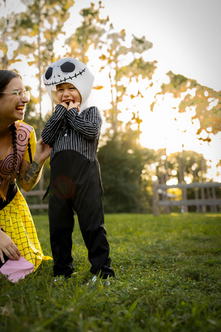 Mom and son posing in costume, soft light